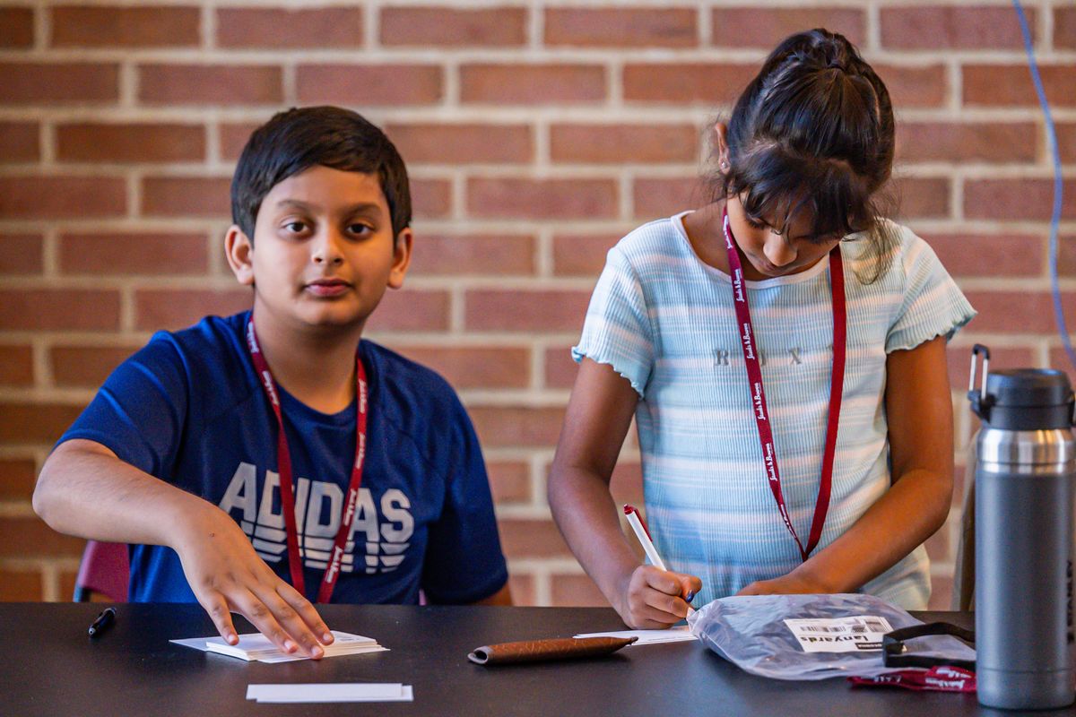 Fairfax Coin Club youth helping the run the show